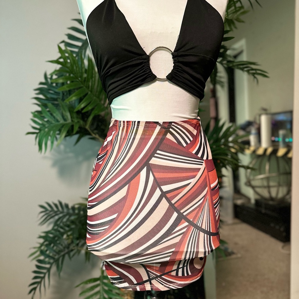 Vintage-inspired mesh see through geo print mini skirt| retro going out skirt